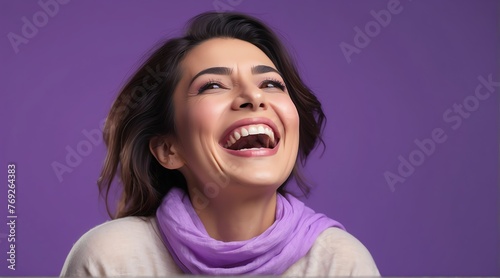 young middle eastern middle aged woman on plain bright purple background laughing hysterically looking at camera background banner template ad marketing concept from Generative AI