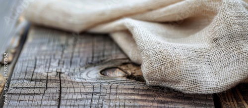 Close-up of a napkin on a wooden table photo