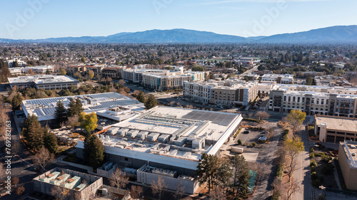 Afternoon sun shines on the buildings of downtown Cupertino, California, USA.