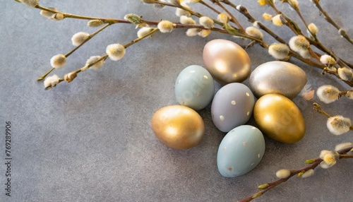 easter eggs on a gray background colorful easter eggs decorate the willow branches