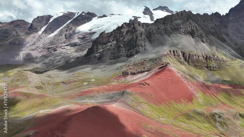 Aerial Drone view of Vinicunca Winikunka Montaña de Siete Colores Rainbow Mountain Andes Mountains Peru photo