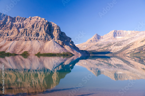 Beautiful picturesque morning lake surrounded by majestic rocky mountains. Bow Lake, Banff National Park, Alberta, Canada