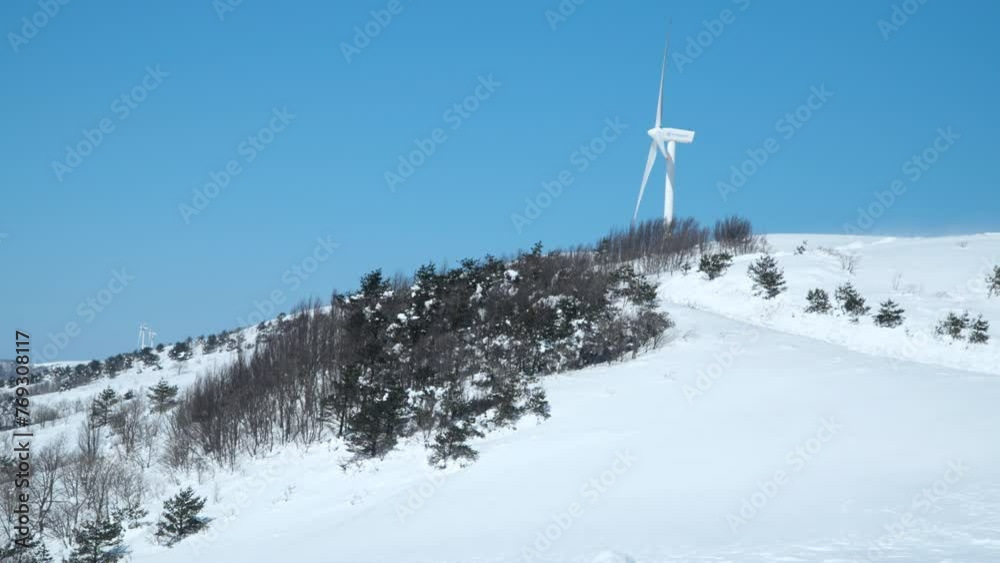 Giant wind turbine in a winter landscape Giant wind turbine in a winter landscape