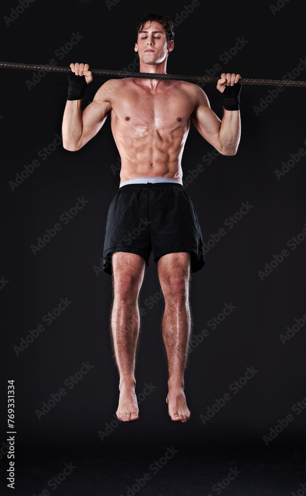 Man, bar and pull up for arm exercise in studio for bicep training or muscle building, gym or workout. Male person, fitness and black background for bodybuilding performance, wellness or mockup space Man, bar and pull up for arm exercise in studio for bicep training or muscle building, gym or workout. Male person, fitness and black background for bodybuilding performance, wellness or mockup space