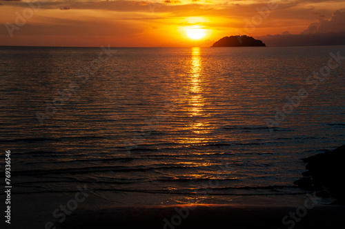 Beautiful sunset at Tanjung Aru Beach, Malaysia.
