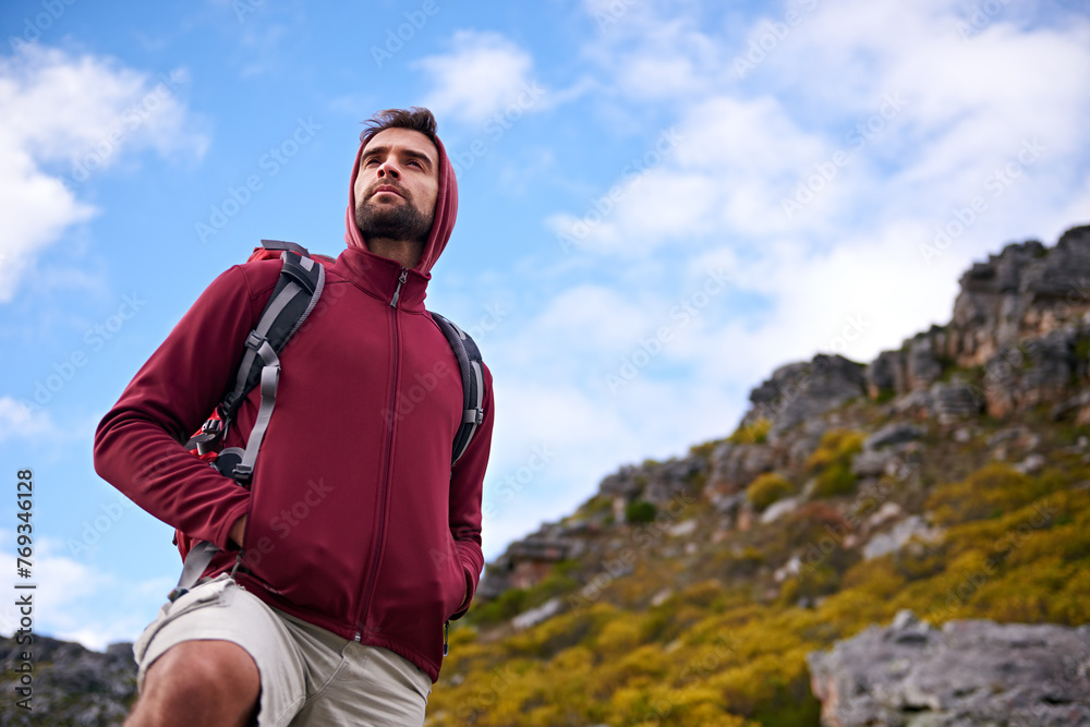 Man, hiking and mountain with bag in nature, Germany trail for conservation. Active, male person on adventure for health and wellness, confident explorer on backpacking for outdoor sport or walk Man, hiking and mountain with bag in nature, Germany trail for conservation. Active, male person on adventure for health and wellness, confident explorer on backpacking for outdoor sport or walk