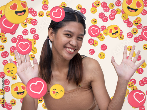 Fotografie A popular Gen Z female influencer garnering love and heart eye emojis signifying overwhelming fan affection and support online or on social media platforms