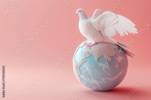 A white dove sits on top of a blue globe