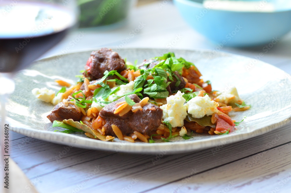 Giouvetsi - Greek lamb and orzo stew. Balkanian cuisine