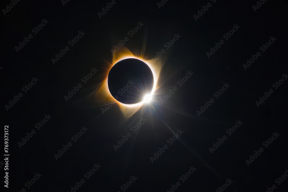 Naklejka premium Solar Eclipse. The moon moving in front of the sun.