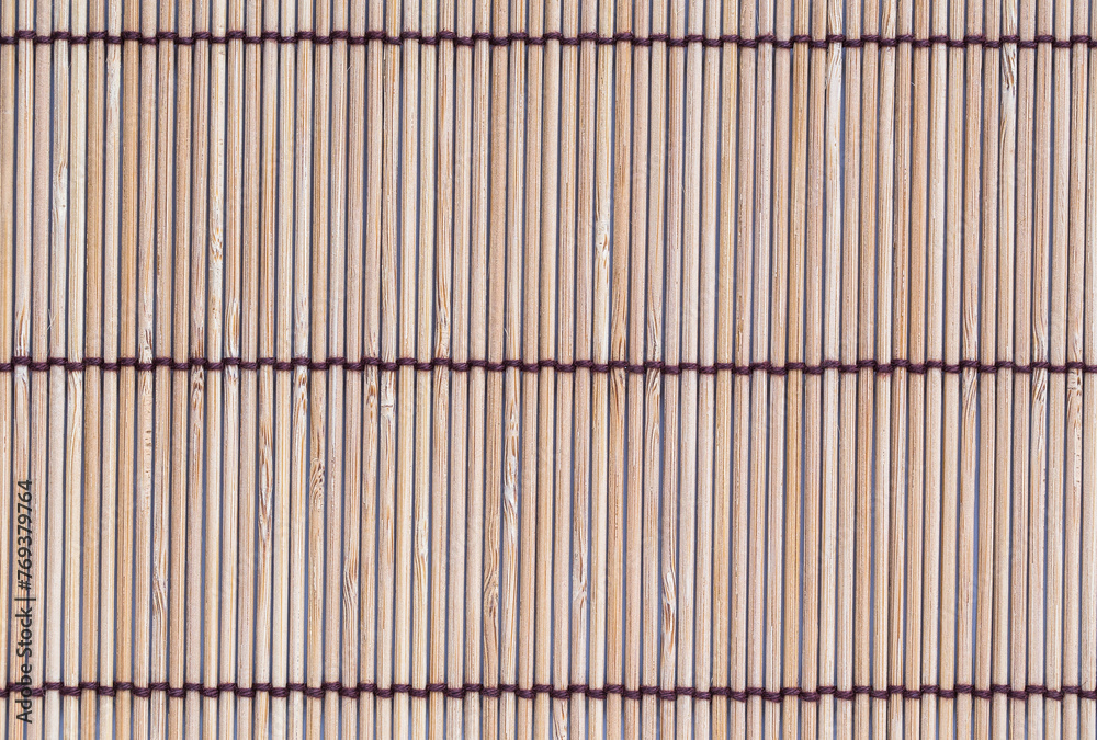 Bamboo mat background. The asian mat from bamboo. natural decor Bamboo mat background. The asian mat from bamboo. natural decor