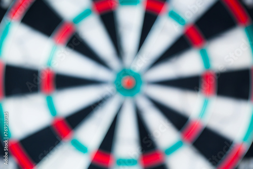 The darts isolated on wooden background