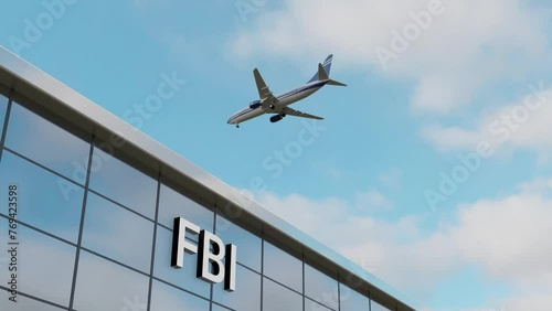 Airplane landing at FBI Building photo