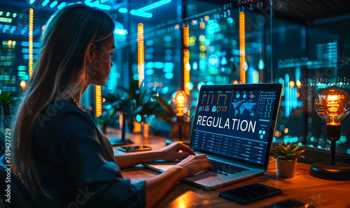 Regulatory compliance and governance framework illustrated through digital icons on a laptop screen, symbolizing the importance of adhering to rules and guidelines in the digital age © Bartek