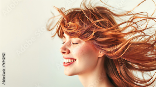 Young woman with highligthed bangs hairstyle on white background, photo