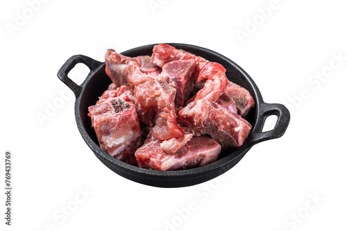 Raw diced meat cubes with bone in a pan.  Isolated, Transparent background. © Vladimir