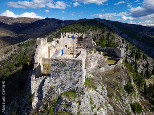 Aerial drone view of the Medieval Fortress in Blagaj or Stjepan Grad in Bosnia and Herzegovina. photo