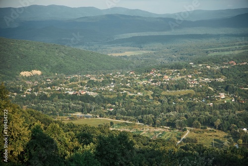Mountain landscape. View from a high point of the village located in the valley.
