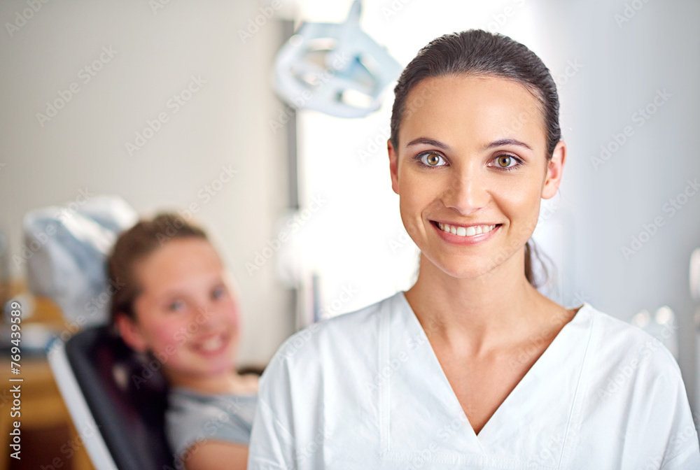 Fototapeta premium Happy, woman dentist and child patient in portrait for dental checkup and consultation in clinic. Orthodontist, smile and kid in chair for oral examination, tooth whitening and gum disease prevention