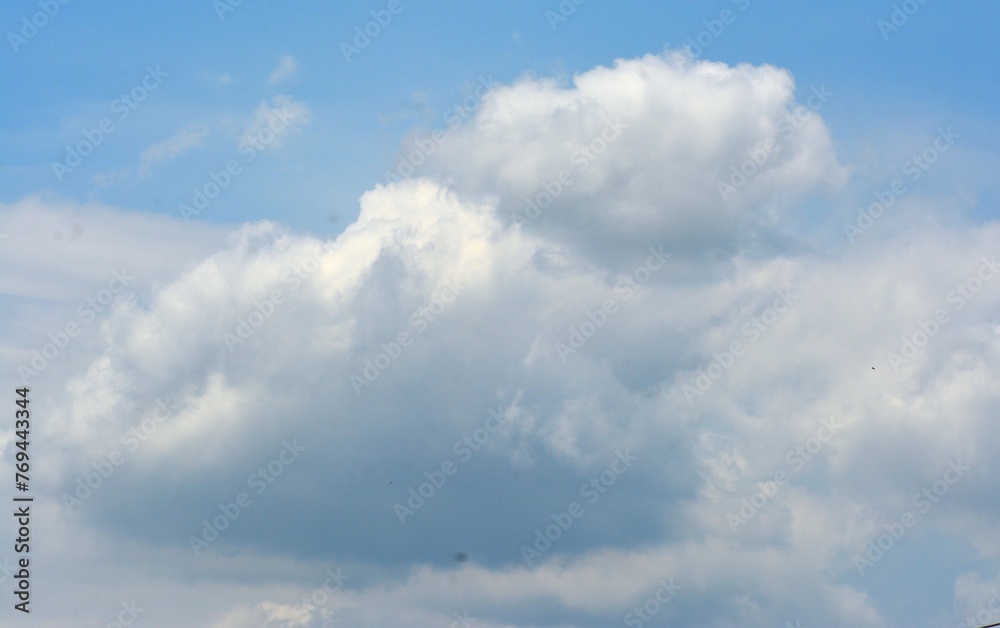 photo of a beautiful view of white clouds and blue sky