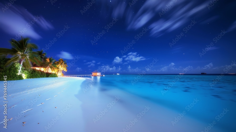 beautiful tropical beach at night with long exposure of the sky