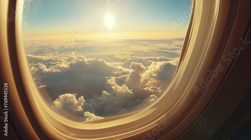 A View From An Airplane Window At Sunset.