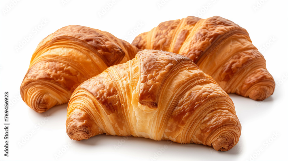 Three croissants are placed against a white background.
