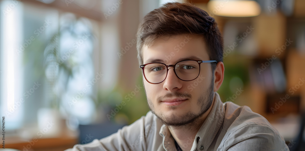 Fototapeta premium Portrait of handsome Man 30 years old working in office