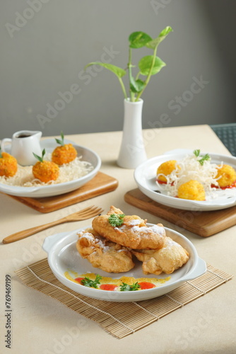 Katsu Curry and cheese on wood table