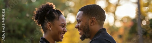 African Couple Sharing a Laugh in Sunset Light