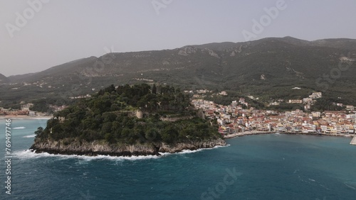 aerial view wild sea waves crushing on rocks in parga town epirus greece © tassos stavrou