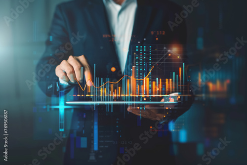 Businessman professional analyzes data and using tablet and analysis sale data graph growth on modern interface icons on strategy, Solution analysis and development on global network connection photo