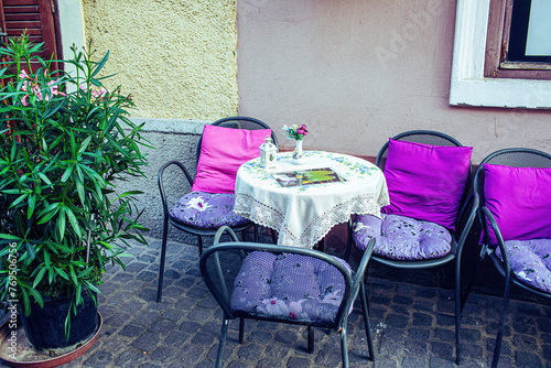 Fototapeta Naklejka Na Ścianę i Meble -  Restaurant outdoor terrace in city centre.Summer season. High quality photo