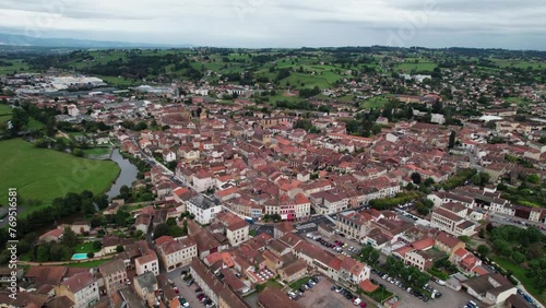 aerial view of the city of Charlieu in Forez on an overcast day ,loire department near Roanne, Auvergne Rhone Alpes Region, Home of a famous cluniac site photo