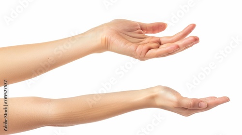 A beautiful woman's palm or wrist isolated on white. Both front and back views show the woman's bent fingers. © Zaleman