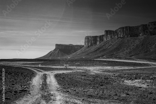 Infrared black and white photography of Sahara desert and Jbel Bani mountains on a way to Foumz Guid in Morocco. 850 nm filter