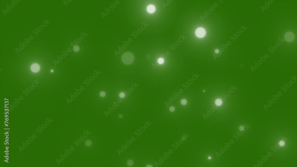 Light particles on green screen background