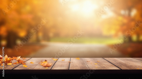 Empty blank wooden table fall background with autumn trees orange yellow color leaves backdrop forest or park nature scene abstract blurred bokeh tabletop for product display desk mockup. Copy space . © Synthetica
