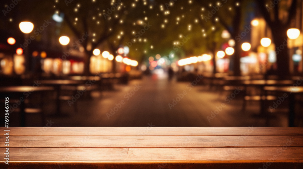 Wooden cafe table bokeh background, empty wood desk restaurant tabletop counter in bar or coffee shop surface product  with blurry city lights backdrop presentation. Mock up, copy space .