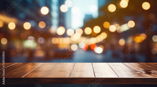 Wooden table bokeh city view background, empty wood desk tabletop counter surface product display mockup with blurry cityscape lights abstract backdrop presentation. Mock up, copy space .