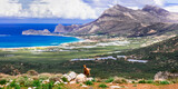 Greece travel . scenic landscape of Crete island. rocky mountains, wild beaches and grazing goats