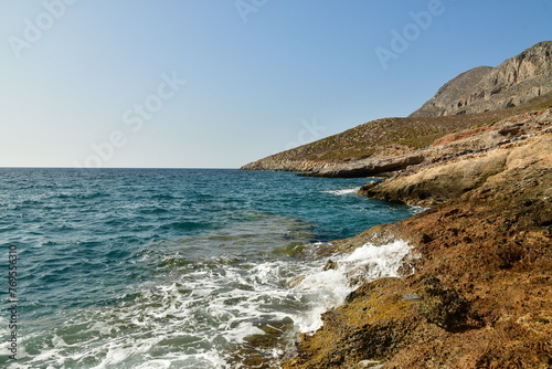 rocky coast kalymnos island greece sumer sun aegean  photo