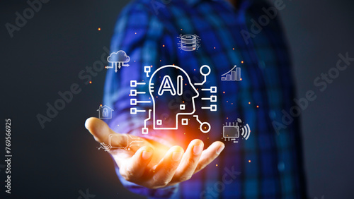 Ai icon at Business hand. Ai technology analysis concept, AI technology Machine learning for data analysis and management.  With artificial intelligence (AI)and information exchange.