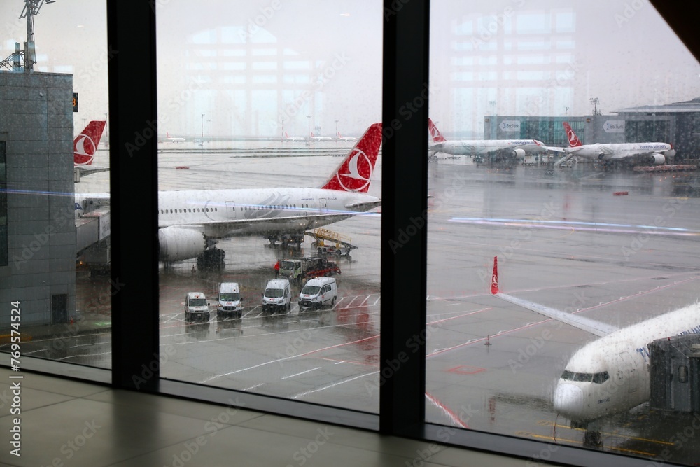 ISTANBUL, TURKEY APRIL 11, 2023 Turkish Airlines aircraft seen from inside Istanbul Airport
