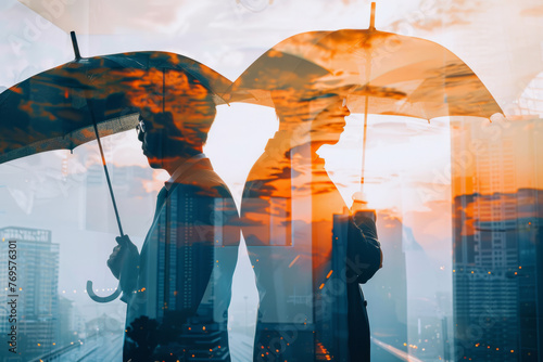 The double exposure image of businessmen opening an umbrella during sunrise, superimposed with a cityscape. The concept of contemporary life