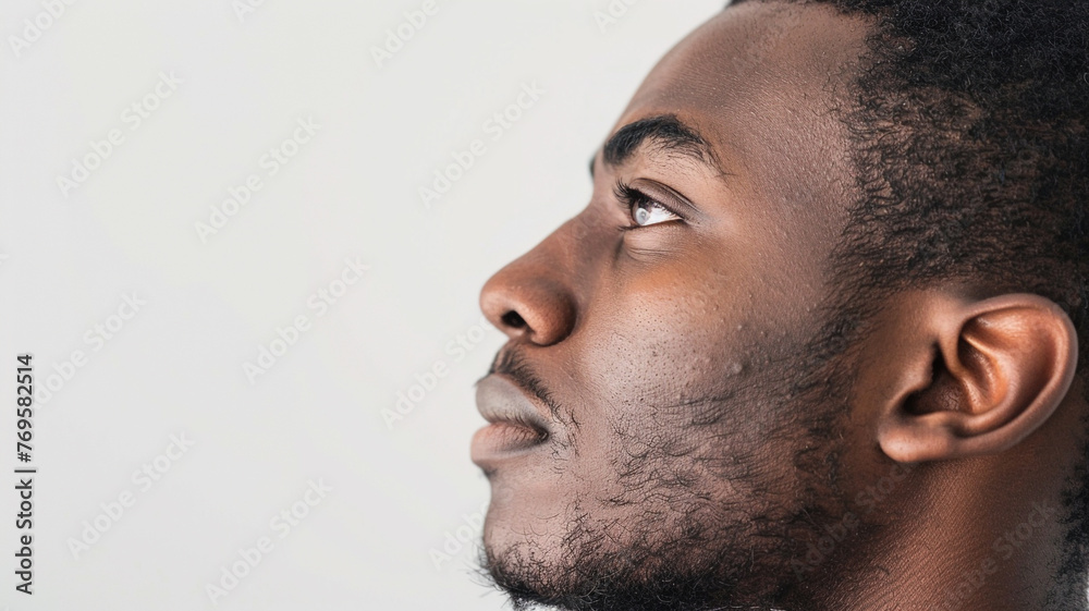 Obraz premium side profile of african man white background