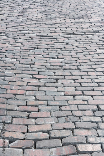 Old cobblestone street road surface © muratart