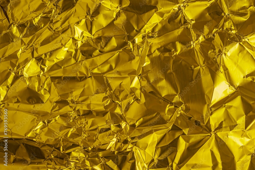 crumpled gold sheet metal. background or texture - obrazy, fototapety, plakaty 