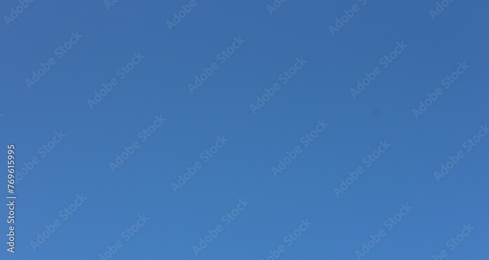 blue sky only no cloud and sunshine. Soft focus blue sky background, copy space horizontal shape - obrazy, fototapety, plakaty 