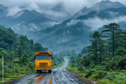 Scenic rural road with bus route through mountainous and foggy autumn countryside.